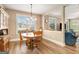 Eat in kitchen area with modern furnishings and a clear view to living room at 1209 Persimmon Way, Mcdonough, GA 30252