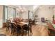 Elegant dining room with chandelier, large windows, and hardwood floors at 1209 Persimmon Way, Mcdonough, GA 30252
