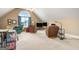 Large upstairs living area with plenty of seating and natural light, perfect for relaxation at 1209 Persimmon Way, Mcdonough, GA 30252