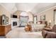 Bright main bedroom features a fireplace, large bed, and a vaulted ceiling, perfect for relaxation at 1209 Persimmon Way, Mcdonough, GA 30252