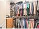 Organized walk-in closet with ample storage space for clothes and accessories at 1209 Persimmon Way, Mcdonough, GA 30252