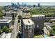 Complex aerial showcasing surrounding scenery and Atlanta skyline views at 1820 Peachtree Nw St # 1008, Atlanta, GA 30309