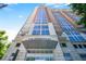 Stunning exterior view of The Brookwood building, showcasing modern architectural design and a prominent entrance at 1820 Peachtree Nw St # 1008, Atlanta, GA 30309