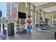Well-equipped gym featuring medicine balls, rowing machine, and other fitness equipment at 1820 Peachtree Nw St # 1008, Atlanta, GA 30309