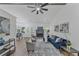 Bright living room features a fireplace, ample seating, and hardwood floors at 3021 Stone Bridge Sw Trl, Conyers, GA 30094