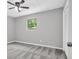 Bedroom has standard window, white closet, and door with carpeted floor at 6607 Forestdale Ln, Douglasville, GA 30135