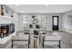 Stylish living room featuring a fireplace and contemporary decor with neutral tones at 6607 Forestdale Ln, Douglasville, GA 30135