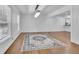 Open dining area with hardwood floors, a modern chandelier, and access to kitchen and living spaces at 2546 N Crestview Dr, Grayson, GA 30017