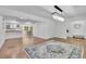 Open dining area with hardwood floors and view to the kitchen and other living areas at 2546 N Crestview Dr, Grayson, GA 30017