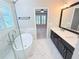 Primary bathroom with soaking tub, glass shower and double vanity at 3871 Portland Trail Dr, Suwanee, GA 30024