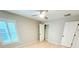 Comfortable bedroom with a ceiling fan and natural light at 3871 Portland Trail Dr, Suwanee, GA 30024