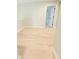 Upstairs hallway featuring light hardwood floors and neutral walls, leading to various rooms at 3871 Portland Trail Dr, Suwanee, GA 30024
