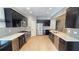 Spacious kitchen with stainless steel appliances, a large island, and tile backsplash at 3871 Portland Trail Dr, Suwanee, GA 30024