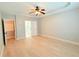Spacious main bedroom with tray ceiling and en-suite bathroom access at 3871 Portland Trail Dr, Suwanee, GA 30024