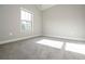 Bright bedroom with plush carpet, neutral walls and plenty of natural light at 6005 Crowley Dr, Douglasville, GA 30135