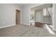 View of living room and staircase, featuring plush carpets and hardwood flooring at 6005 Crowley Dr, Douglasville, GA 30135