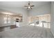 Open-concept living room showcasing fireplace, with views to kitchen and dining area at 6005 Crowley Dr, Douglasville, GA 30135
