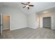 Large main bedroom with vaulted ceiling, carpet flooring, walk-in closet, and en suite bathroom at 6005 Crowley Dr, Douglasville, GA 30135