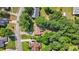 Aerial view of a landscaped property surrounded by lush greenery at 625 Chaseridge Dr, Mcdonough, GA 30253