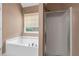 Bathroom featuring a large soaking tub and separate glass-enclosed shower at 625 Chaseridge Dr, Mcdonough, GA 30253