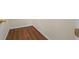 Walk-in closet with wood-look flooring and ample storage at 625 Chaseridge Dr, Mcdonough, GA 30253
