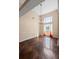 Open dining room with sleek stained concrete floors and modern lighting at 625 Chaseridge Dr, Mcdonough, GA 30253