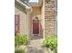 Close up of the home's front door and stone accents by the entryway at 625 Chaseridge Dr, Mcdonough, GA 30253