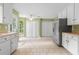 Spacious kitchen with stainless steel refrigerator, and double pantry providing ample storage at 625 Chaseridge Dr, Mcdonough, GA 30253