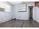 Bedroom with hardwood floors, natural light, neutral walls and closet at 1112 Mealor Rd, Lawrenceville, GA 30043