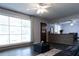 Open-concept living space with large windows and stylish flooring, leading to the entryway at 1112 Mealor Rd, Lawrenceville, GA 30043