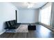 Bright living room featuring new floors and a large window that provides ample natural light at 1112 Mealor Rd, Lawrenceville, GA 30043