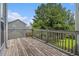 Spacious wood back deck perfect for relaxing and entertaining outdoors at 201 Providence Dr, Dallas, GA 30157