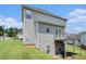 Exterior view of the home featuring a walkout basement and back deck at 201 Providence Dr, Dallas, GA 30157