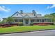 Charming home exterior showcasing a manicured lawn, inviting front porch at 201 Providence Dr, Dallas, GA 30157