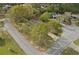 Aerial view of a home on a corner lot, surrounded by trees and lush greenery at 3916 S Martin Way, Lithia Springs, GA 30122
