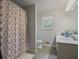 Cozy bathroom with tile floors, shower and tub combination, and modern vanity at 3916 S Martin Way, Lithia Springs, GA 30122
