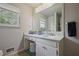 Inviting bathroom features white cabinets, modern fixtures, and natural light at 3916 S Martin Way, Lithia Springs, GA 30122