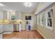 Bright kitchen features an eating area with multiple windows at 3916 S Martin Way, Lithia Springs, GA 30122