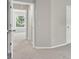 Neutral bedroom with carpet and light gray walls, doorway in the background at 5740 Zelkova Dr, Cumming, GA 30040
