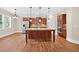 Spacious kitchen featuring an island, stainless steel appliances, and lots of cabinet space at 5740 Zelkova Dr, Cumming, GA 30040