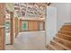 Large unfinished basement featuring exposed beams, insulation, and a framed window at 5740 Zelkova Dr, Cumming, GA 30040