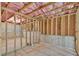 Unfinished basement space showing the bare framing and utility infrastructure at 5740 Zelkova Dr, Cumming, GA 30040