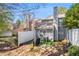 Grassy backyard featuring a stone patio perfect for outdoor entertaining and relaxing in the sun at 1221 Overton Dr, Lawrenceville, GA 30044