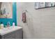 Stylish powder room featuring new fixtures and a decorative mirror at 1221 Overton Dr, Lawrenceville, GA 30044