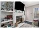 Bright fireplace in living room with hardwood floors and decor at 1221 Overton Dr, Lawrenceville, GA 30044
