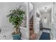 Inviting foyer with staircase, decor and new flooring at 1221 Overton Dr, Lawrenceville, GA 30044