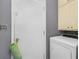 Functional laundry area with a dryer and additional storage at 1221 Overton Dr, Lawrenceville, GA 30044