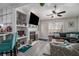 Bright living room with hardwood floors, fireplace and built in shelves at 1221 Overton Dr, Lawrenceville, GA 30044