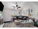 Cozy living room featuring vaulted ceilings, hardwood floors, and lots of natural light at 1221 Overton Dr, Lawrenceville, GA 30044