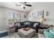 Cozy living room featuring vaulted ceilings, hardwood floors, and lots of natural light at 1221 Overton Dr, Lawrenceville, GA 30044